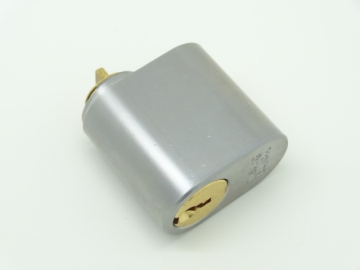 Trioving 5537/SC lock cylinder, satin chrome finish.